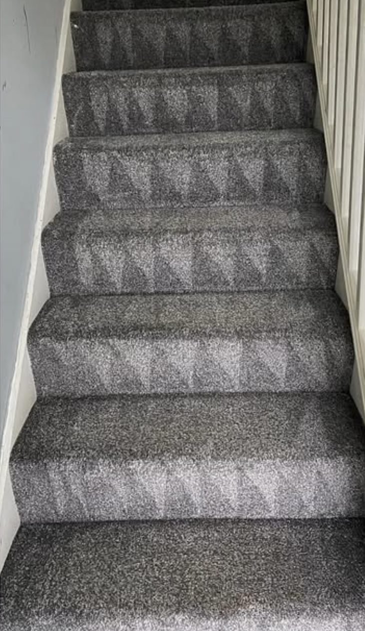 Stair carpet with the traffic lane lifted out after cleaning
