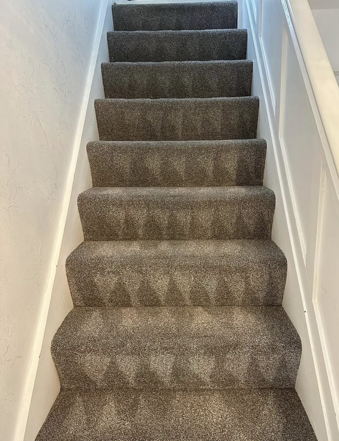 Beige staircase carpet after cleaning