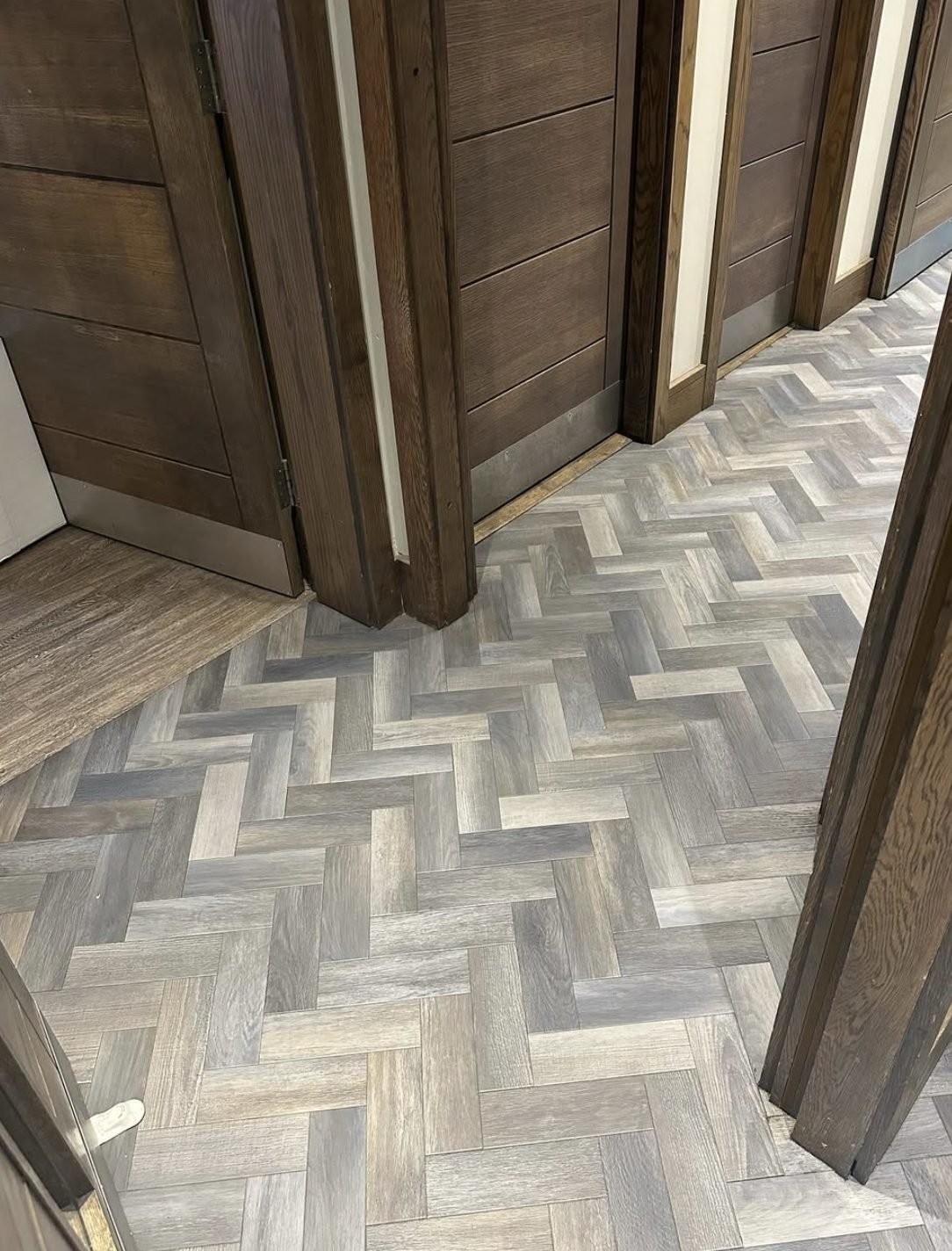 Herringbone vinyl floor cleaned and buffed