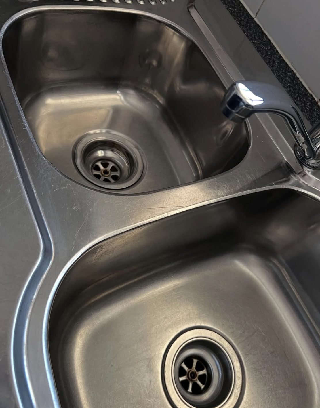 Stainless steel sink and taps polished